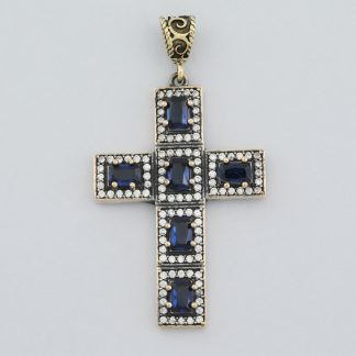 Colgante cruz zafiro con marcasitas.