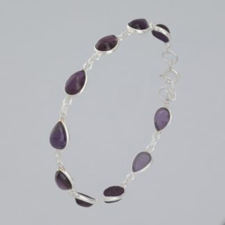 Pulsera articulada con piedras de 20-21 cm.