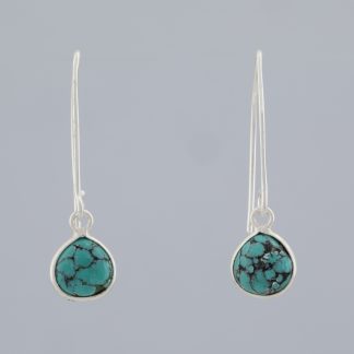Pendientes gancho pez howlita turquesa.