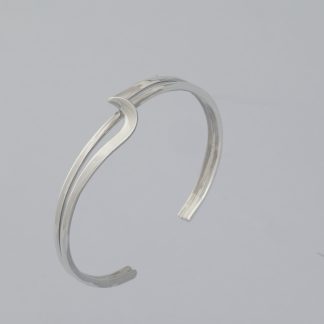 Brazalete dos tubos, uno aplastado de 5 mm de ancho